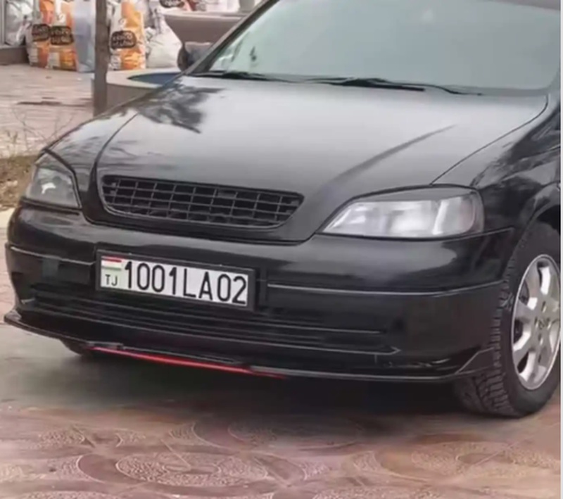 Губа на передний бампер от Opel Astra G